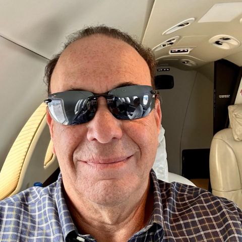 Jon Taffer is inside a private jet.